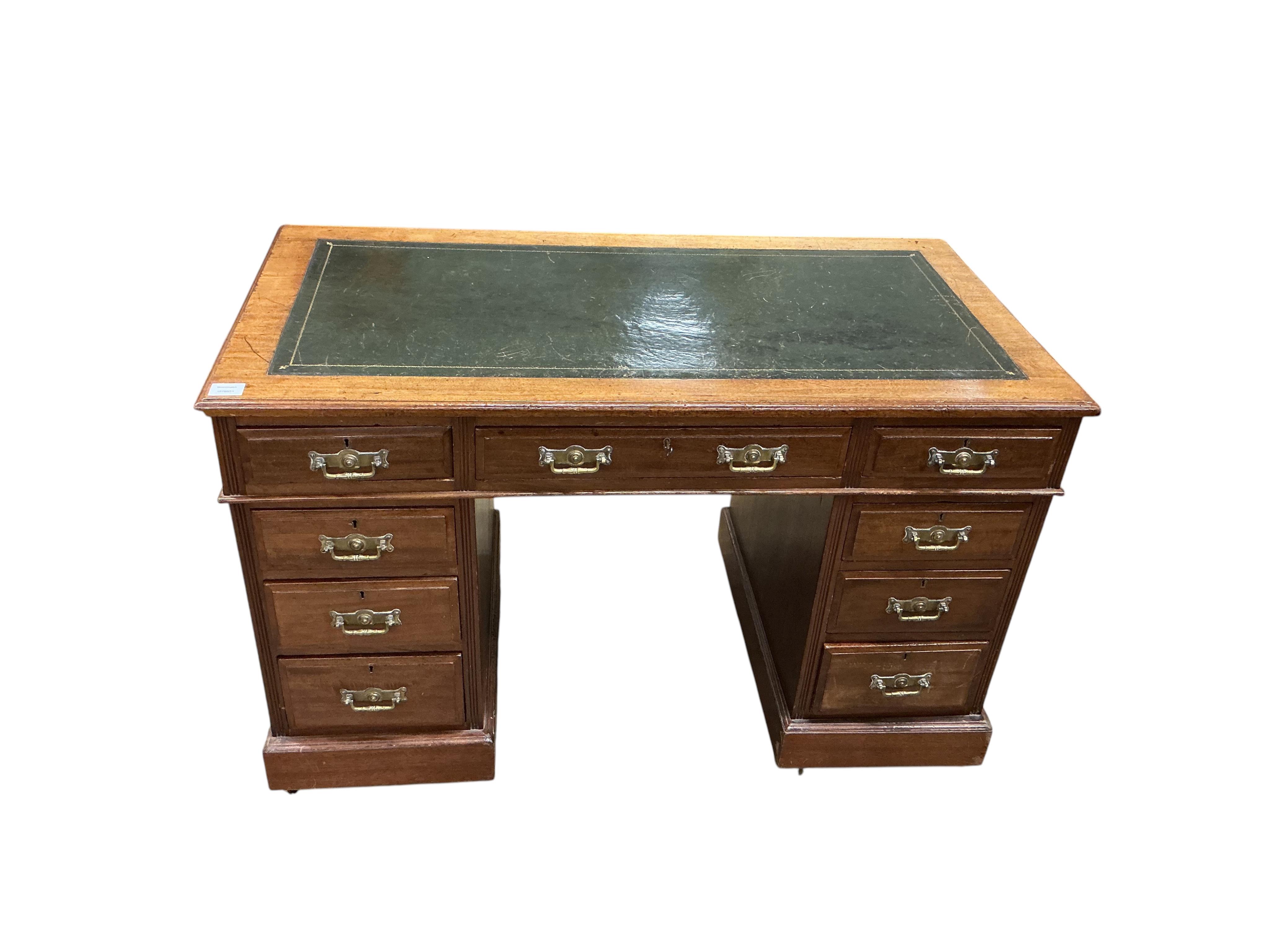 A late Victorian mahogany pedestal desk, width121cm, depth 64cm, height 74cm